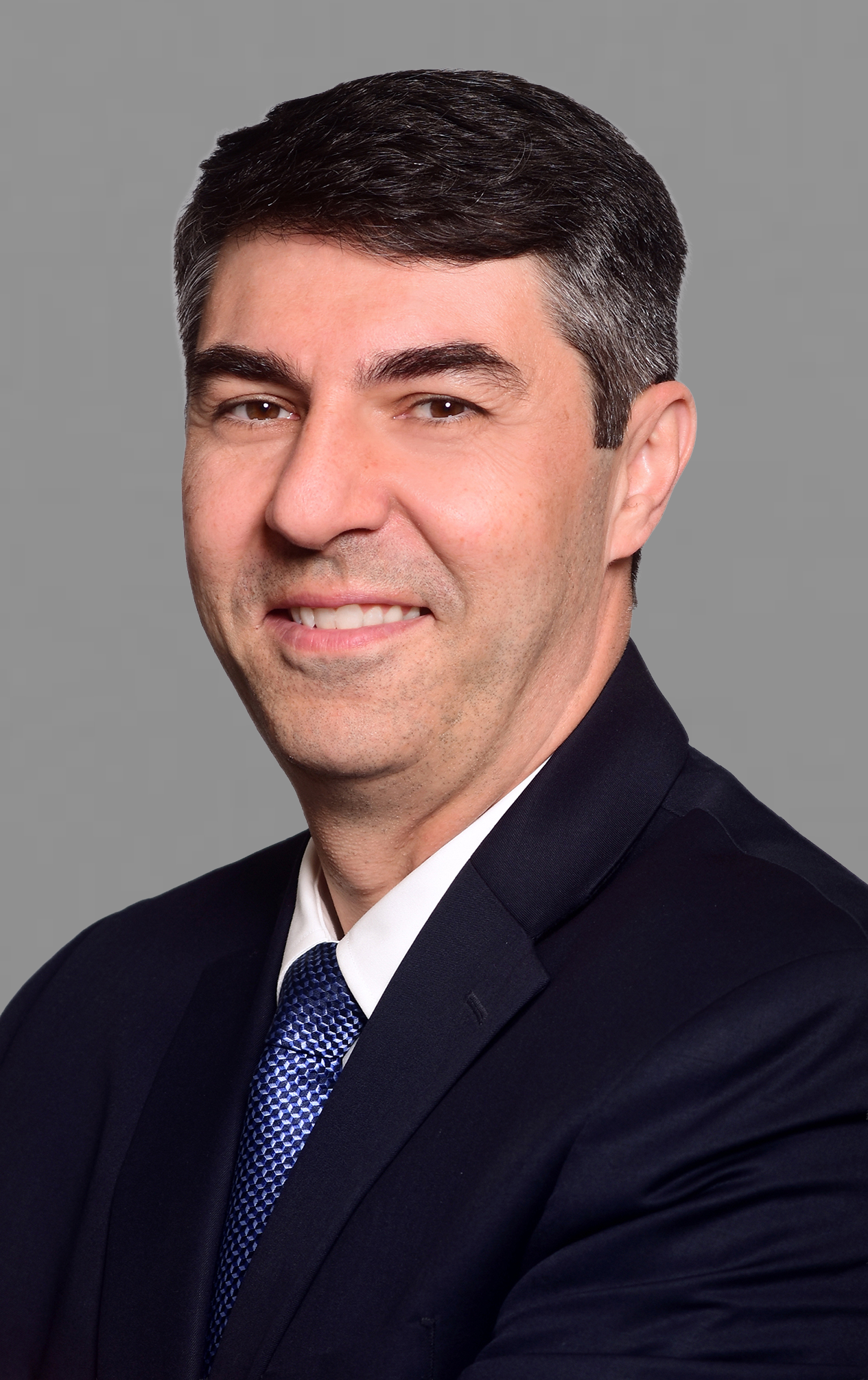 Nik Migias, MD.