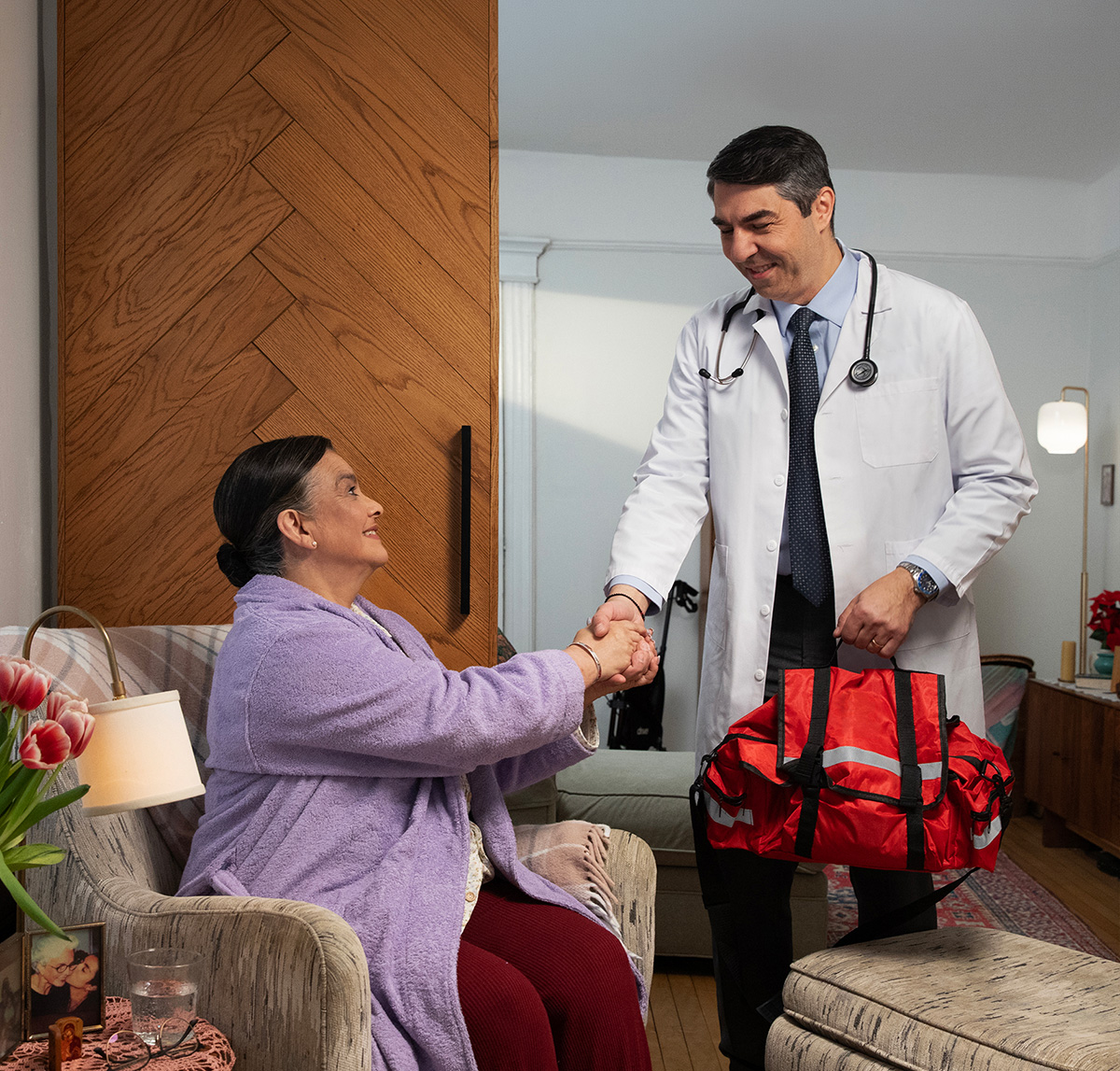 Caregiver and patient sharing a warm moment